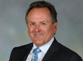 Board of Trustee Chair John R. Yurtchuk